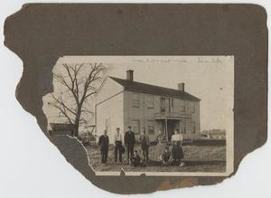 [Photograph of Family and Home]