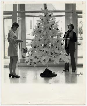 [Photograph of Students Decorating Christmas Tree]