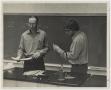 Photograph: [Photograph of Professor and Student]