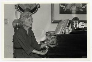 [Photograph of Boog Eyssen at a Piano]