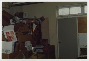 [Photograph of Boxes in Old Main Storeroom]