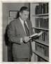 Photograph: [Photograph of Andrew Hunt with Book]