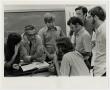 Photograph: [Photograph of Students and Professor in Science Class]