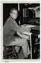 Photograph: [Photograph of Frank McCullough at Loom]