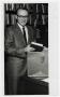 Photograph: [Photograph of Bert Affleck With Briefcase]