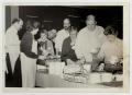 Photograph: [Photograph of Dr. Thomas Kim in a Cafeteria Line]