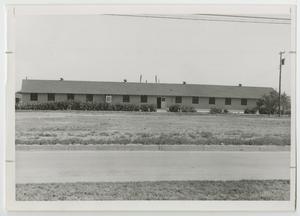 [Photograph of Barracks Building]