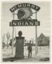 Photograph: [Photograph of Man Standing Beneath McMurry Indians Sign]