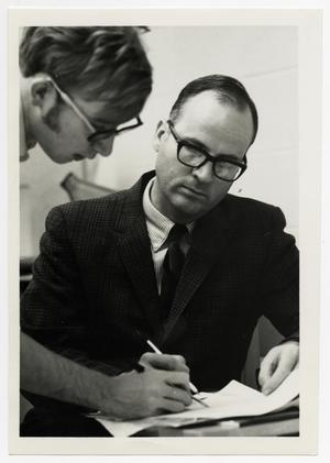 [Photograph of Dr. Roy W. Sonntag with a Student]