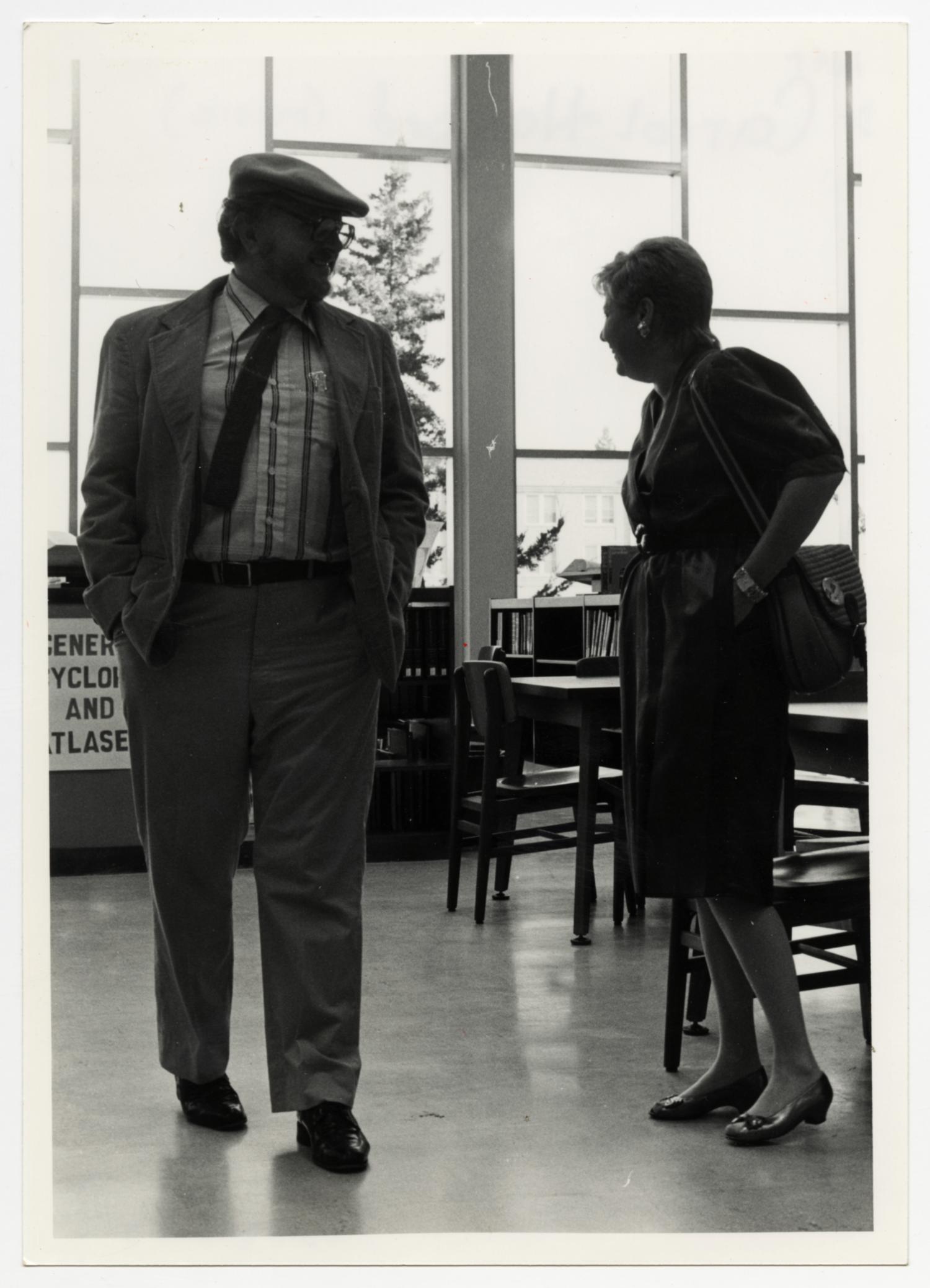 [Photograph of Dr. Carrol Haggard in the Library]
                                                
                                                    [Sequence #]: 1 of 2
                                                