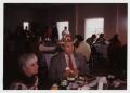 Primary view of [Photograph of Dr. John Russell at Christmas Party]