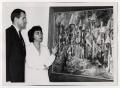 Photograph: [Photograph of Couple Looking at Painting]