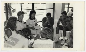 [Photograph of Students Sitting in a Circle]