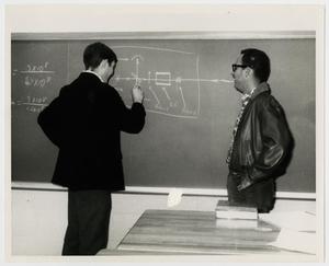 Primary view of object titled '[Photograph of Two Students in a Classroom]'.