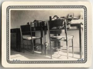 Primary view of object titled '[Tables and chairs in dormitory room at Lutheran Concordia College]'.