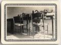 Thumbnail image of item number 1 in: '[Tables and chairs in dormitory room at Lutheran Concordia College]'.