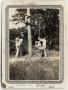 Photograph: [Lutheran Concordia College student climbing a pole]