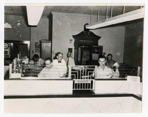 Primary view of object titled '[Photograph of First National Bank in Hallettsville, Texas]'.