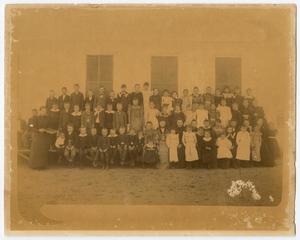 [Photograph of School Students and Teacher]