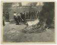 Thumbnail image of item number 1 in: '[Photograph of Men Putting Out Fire]'.