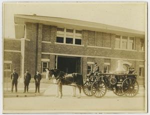 [Photograph of Horses Pulling a Steamer]