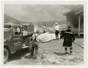 [Firemen and Truck at Training Grounds]