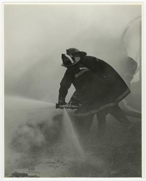 Primary view of object titled '[Photograph of Firefighters Holding Hoses]'.