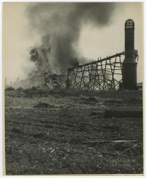 [Photograph of a Smoking Building on Fire]
