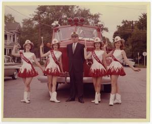 [Photograph of Flamettes with Fire Chief Chriswell]