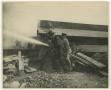 Photograph: [Firefighters Spraying Water at Fire]