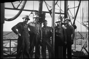 [Photograph of Oil Drilling Crew]