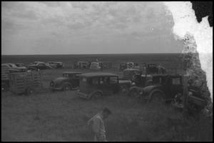Primary view of object titled '[Photograph of Cars and Trailers at Gallier Ranch]'.