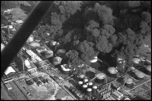 [Photograph of Refinery Fire]