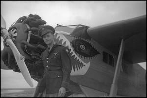 [Photograph of Commander Major George Haddaway and Airplane]