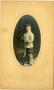 Photograph: [Photograph of a Young Boy with Rifle]