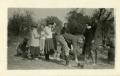 Photograph: [Photograph of Young Adults Outside at Picnic]