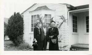 [Photograph of Group in Front of House]