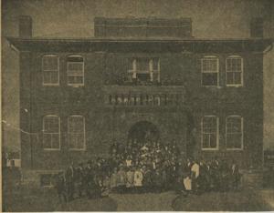 Primary view of object titled '[Newspaper Clipping of Administration Building]'.