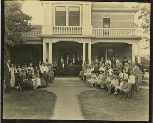 [Photograph of Group in Front of President's Home]