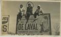 Primary view of [Photograph of Women on DeLaval Signboard]