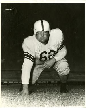 [Photograph of "Tiny" Moore in Football Stance]