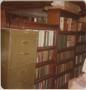 Photograph: [Photograph of Bookshelves in Basement]