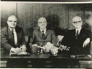 [Photograph of Three Men on Couch]