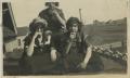 Photograph: [Photograph of Women Eating Cookies]