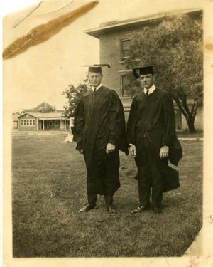 [Photograph of Two Graduates]