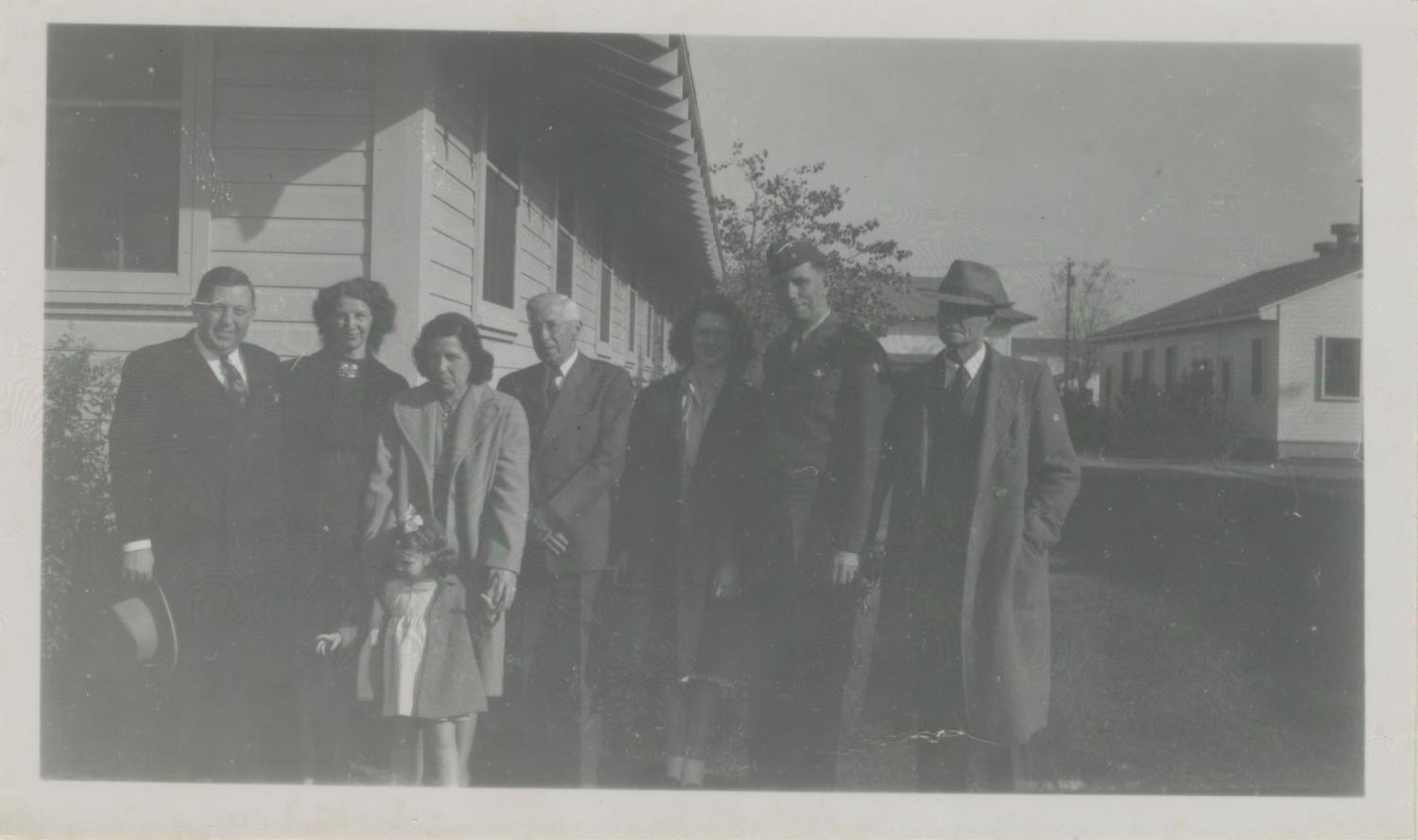 [Photograph of Group in Front of Officer's Club]
                                                
                                                    [Sequence #]: 1 of 1
                                                