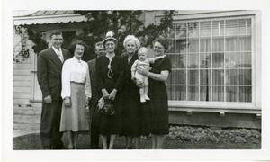 Primary view of object titled '[Photograph of Group in Front of W. H. Howard Home]'.