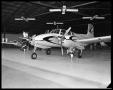 Photograph: [Airplanes on Display in Hanger]