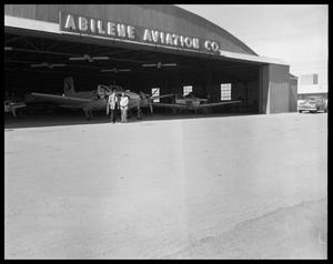 Primary view of object titled '[Abilene Aviation Company Hanger]'.