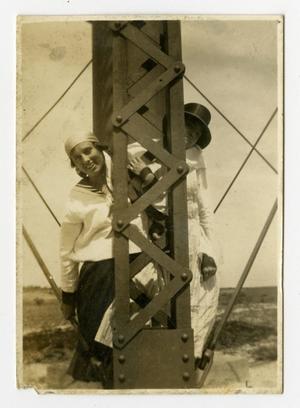[Two Girls Holding on to a Girder]
